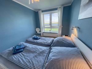 Postel nebo postele na pokoji v ubytování Schleipanorama in Maasholm
