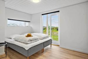 Postel nebo postele na pokoji v ubytování JB362-Brovst-Kronvildtvej-136