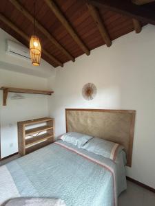 Postel nebo postele na pokoji v ubytování Casa Luminah