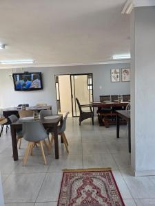 TV a/nebo společenská místnost v ubytování The Residence