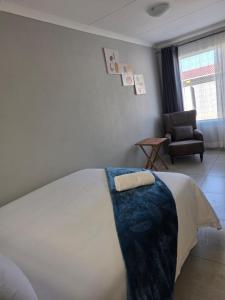 Postel nebo postele na pokoji v ubytování The Residence + 7 fotografií