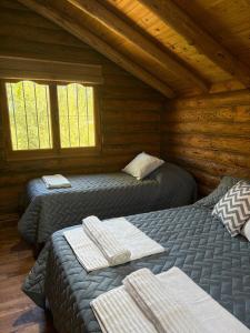 Postel nebo postele na pokoji v ubytování Altandes Cabañas