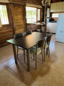 Kuchyň nebo kuchyňský kout v ubytování Altandes Cabañas