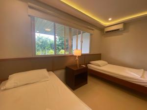 Ένα ή περισσότερα κρεβάτια σε δωμάτιο στο Casa Las Brisas