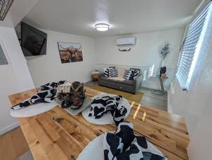 a living room with a couch and a table at Casa Valencia in Tucson