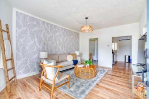 a living room with a couch and a table at Stay Portland - Perfect Brooklyn 1 Bedroom in Portland