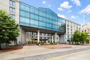 an office building with a glass facade at The Riverfront Hotel New Orleans in New Orleans