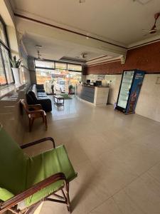 a large room with chairs and tables in a store at Exclusive Premier Park Tvm in Trivandrum