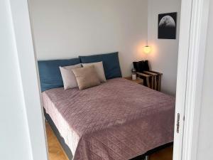 Una cama o camas en una habitación de 5 star holiday home in Aarhus C