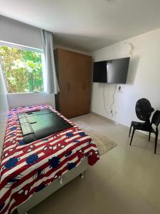 Μια τηλεόραση ή/και κέντρο ψυχαγωγίας στο Casa Miss Paripueira +5 φωτογραφίες