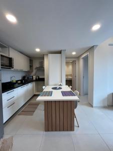 Kuchyň nebo kuchyňský kout v ubytování Washington Park Deptos