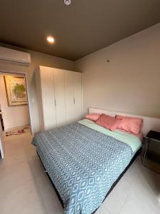 Postel nebo postele na pokoji v ubytování Washington Park Deptos