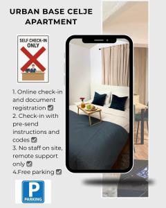 an iphone screen with a bed in a room at URBAN BASE CELJE Apartment with FREE Parking & Terrace in Celje