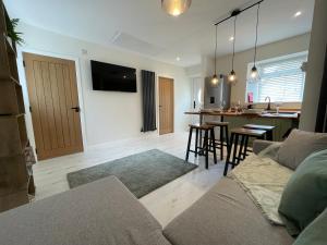 Μια τηλεόραση ή/και κέντρο ψυχαγωγίας στο Pan Ha Cottage +41 φωτογραφίες