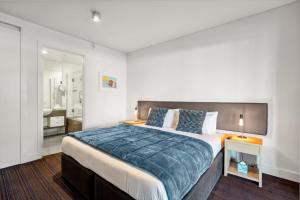 Ένα ή περισσότερα κρεβάτια σε δωμάτιο στο Waterfront 3 Bedroom Marina Gem