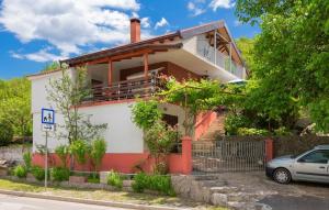 a house with a car parked in front of it at Family friendly house with a swimming pool Grab, Zagora - 15208 in Grab