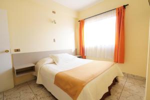 Ένα ή περισσότερα κρεβάτια σε δωμάτιο στο Hotel Frontera