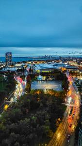 a night view of a city with traffic and lights at Lux suite - City View - Steps to Rogers Centre & CN Tower in Toronto