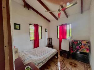 Ένα ή περισσότερα κρεβάτια σε δωμάτιο στο Centro Holistico Casa Orion