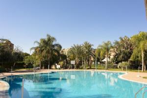 Bazén v ubytování Oasis de sérénité, bel appartement avec piscines nebo v jeho okolí