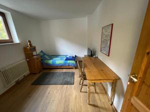 Ένα ή περισσότερα κρεβάτια σε δωμάτιο στο Gasthaus Liam C