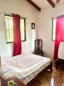 Ένα ή περισσότερα κρεβάτια σε δωμάτιο στο Centro Holistico Casa Orion