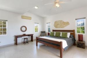 Postel nebo postele na pokoji v ubytování villa kiki + 16 fotografií