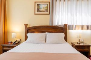 Cama o camas de una habitación en El Marquez Huancayo 7 fotos más