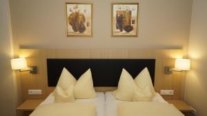Postel nebo postele na pokoji v ubytování Hotel Anika