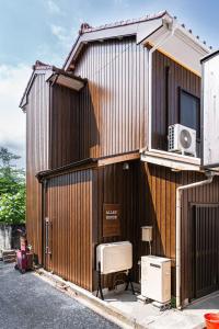 un edificio con calefacción y aire acondicionado. en ALLEY HOUSE-nachikatsuura, en Nachikatsuura