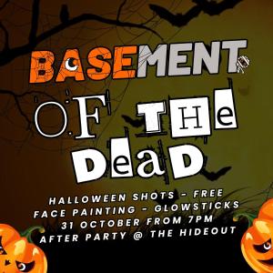 a flyer for a halloween event with pumpkins at Base Backpackers in Ho Chi Minh City