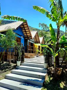 a set of stairs leading to a house at Recanto do Sossego in São Sebastião