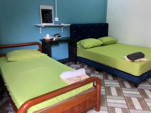 Ένα ή περισσότερα κρεβάτια σε δωμάτιο στο Ummi chalet