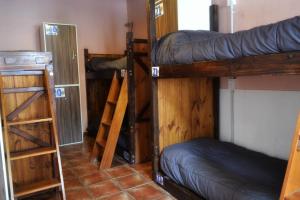 Palanda nebo palandy na pokoji v ubytování Patagonia Jazz Hostel