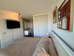 TV a/nebo společenská místnost v ubytování Precioso y Maravilloso depto en Montemar