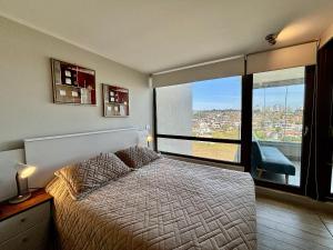 Postel nebo postele na pokoji v ubytování Precioso y Maravilloso depto en Montemar + 25 fotografií