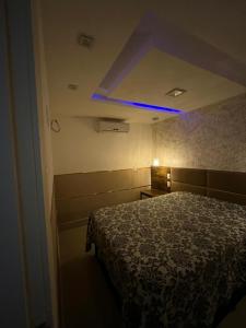 Postel nebo postele na pokoji v ubytování Mar do Cabo Suítes