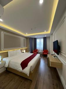 Postel nebo postele na pokoji v ubytování Hotel Villa Ju + 41 fotografií
