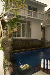 Bazén v ubytování Villa Pangkung nebo v jeho okolí