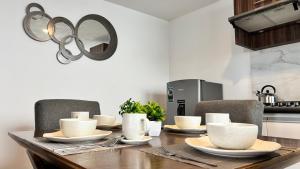 Η κουζίνα ή μικρή κουζίνα στο Bonito Departamento en Metepec +11 φωτογραφίες