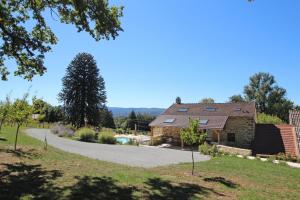 a house with a road leading to it at Chez marie-louise in Fromental