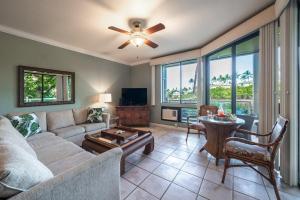 a living room with a couch and a table at Grand Champions 179 · GC 179 Last Minute Deal at 3BD Wailea Cond in Wailea