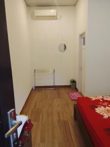 Postel nebo postele na pokoji v ubytování Pandava House Lombok