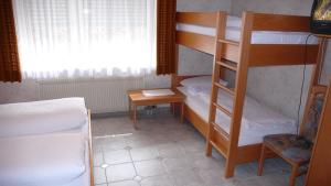 Postel nebo postele na pokoji v ubytování Hotel Anika