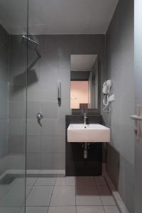Koupelna v ubytování T+ Hotel Sungai Korok + 57 fotografií