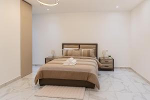 Postel nebo postele na pokoji v ubytování Residence ACN 2B