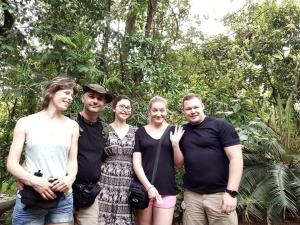 a group of people posing for a picture at Budget Room By Green House Resort in Sigiriya