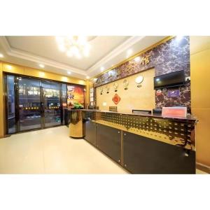 Kuchyň nebo kuchyňský kout v ubytování Ying Feng Yuan Hotel