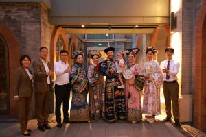 a group of people posing for a picture at Dongsi No 78 Boutique Apartment in Beijing