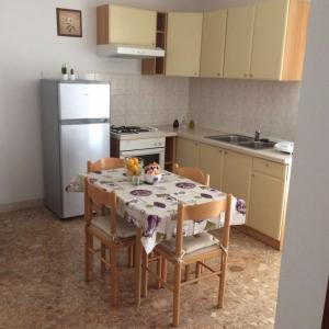 Kuchyň nebo kuchyňský kout v ubytování Apartments Vini and Ivana